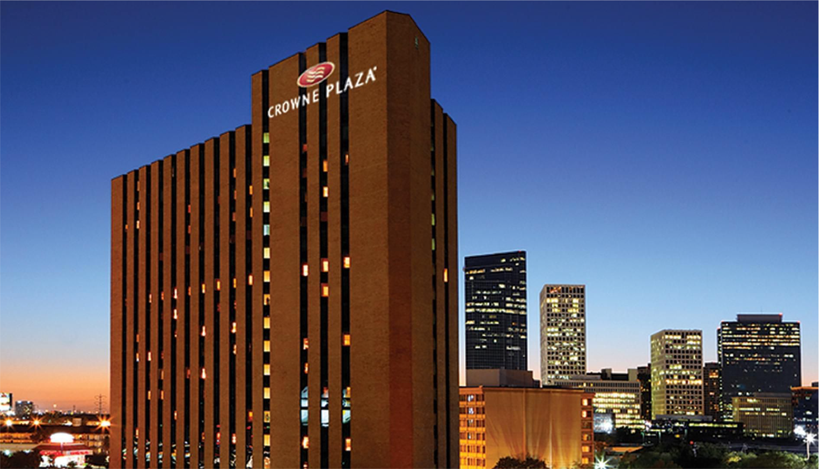 Crowne Plaza Houston — conference venue skyline at dusk